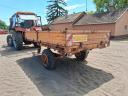 Single-axle tipper trailer with iron sides and platform