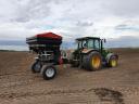 DCM M36 S suspended weighing fertiliser spreader with ISOBUS section and dose control + tractor trolley