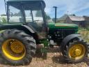 John Deere 2450, 4x4, with single row reel