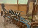 John Deere 2450, 4x4, with single row reel