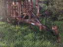 Heavy-duty cultivator, four and a half metres wide, semi-suspended, with a working roller