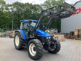 New Holland TS 115 homlokrakodóval