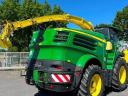 John Deere 8500i with grain spreader, pick-up, corn adapter