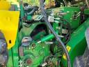John Deere 8500i with grain spreader, pick-up, corn adapter