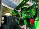 John Deere 8500i with grain spreader, pick-up, corn adapter