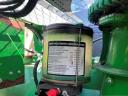 John Deere 8500i with grain spreader, pick-up, corn adapter