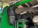 John Deere 8500i with grain spreader, pick-up, corn adapter