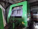 John Deere 582 round baler with net