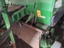 John Deere 582 round baler with net