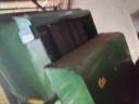 John Deere 582 round baler with net