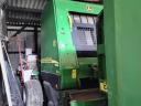 John Deere 582 round baler with net