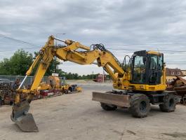 Komatsu PW118MR-11 gumikerekes kotró