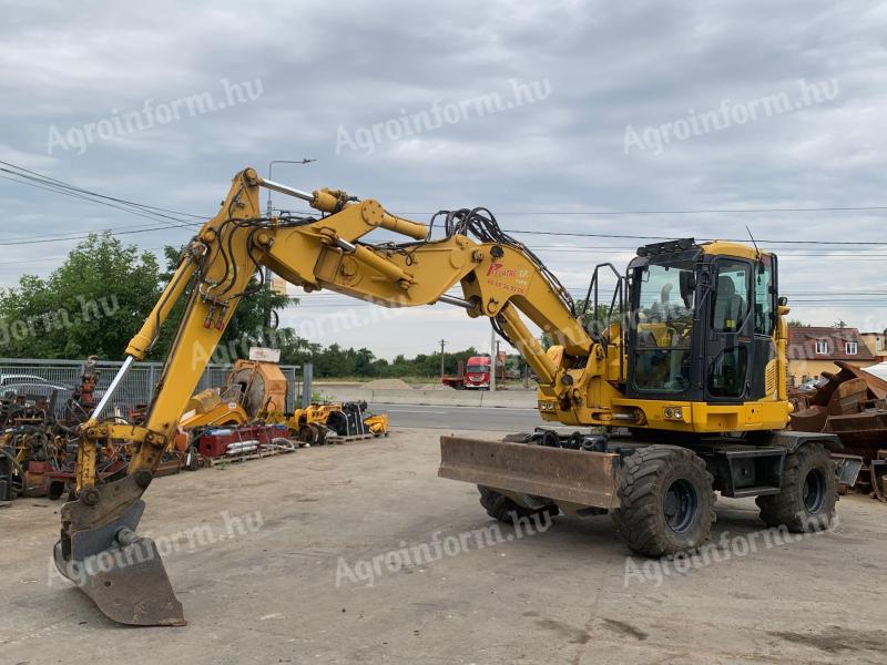 Komatsu PW118MR-11 gumikerekes kotró