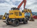 Komatsu PW118MR-11 gumikerekes kotró