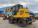 Komatsu PW118MR-11 gumikerekes kotró