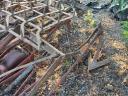 Row cultivator with boron