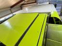 CLAAS TUCANO 450 APS combine harvester with cutting table and transport trolley