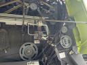 CLAAS TUCANO 450 APS combine harvester with cutting table and transport trolley