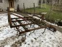 Combiner, cultivator, spring tine