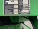 John Deere W650 combine harvester with grain table, with transport wagon