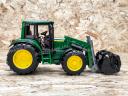 ÚJ John Deere 6920 játéktraktor homlokrakodós. valósághű funkciók,strapabíró kialakítás ABS műanyagból, 4 éves kortól ajánlott,1:16 méretarány